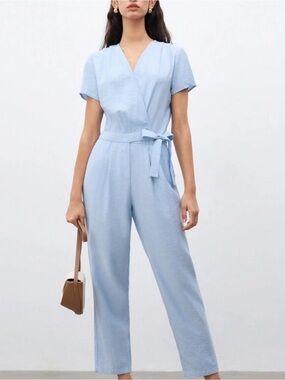 Woman’s summer blue shirt sleeve v neck jumpsuit